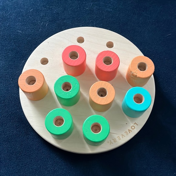 Lovevery Toys Lovevery Stacking Fine Motor Peg Blocks Poshmark
